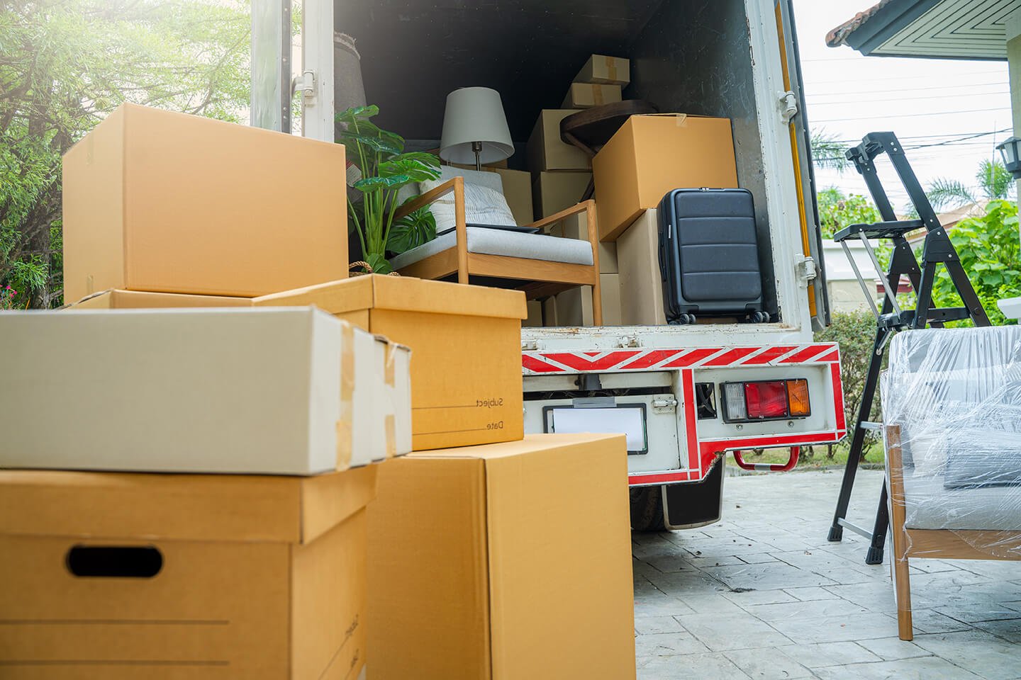 boxes-waiting-to-be-moved-into-a-new-home-new-home-with-smooth-move-movers